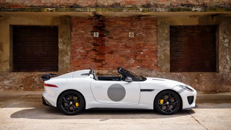Sleek White Convertible Sports Car Wallpaper wallpaper