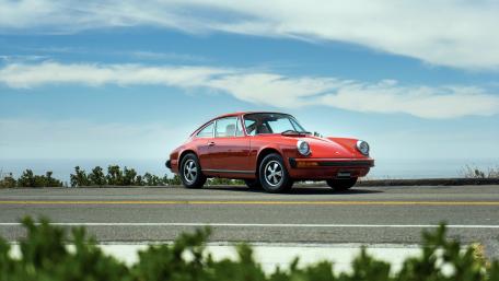 Classic Red Porsche on Coastal Road wallpaper