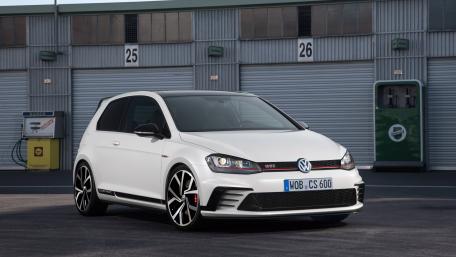 Sleek Volkswagen GTI in Urban Setting wallpaper