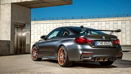 Sleek BMW M4 in Stunning Urban Setting wallpaper