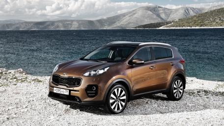 Sleek Brown SUV by the Coastline wallpaper