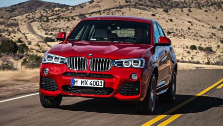 Dynamic Red BMW X4 on Open Road Adventure wallpaper