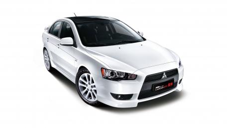Sleek White Mitsubishi Car Design Wallpaper wallpaper