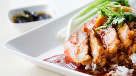 Delicious Asian-Inspired Dish with Tender Chicken and Rice wallpaper