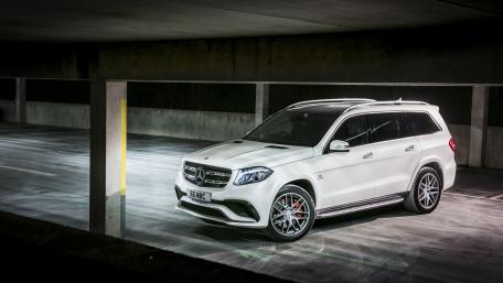 Sleek Mercedes SUV in Modern Parking Garage wallpaper