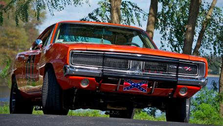 Vintage Dodge Charger in Nature's Embrace wallpaper