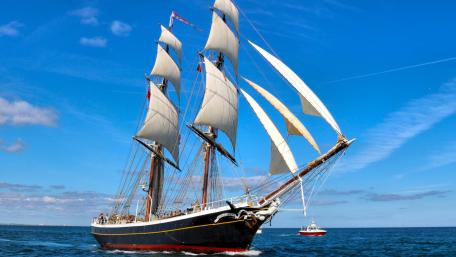 Majestic Sailing Ship on Open Waters wallpaper