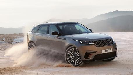 Sleek SUV Mastering the Terrain wallpaper
