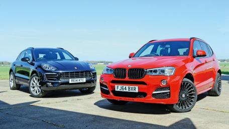Sleek SUVs Perfectly Positioned for a Showdown wallpaper