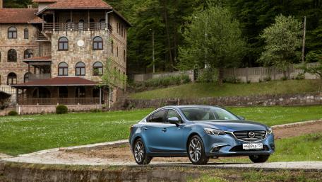 Sleek Blue Car by Rustic Mansion wallpaper
