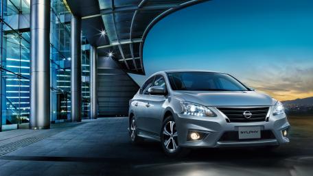 Sleek Nissan Sylphy in Modern Urban Setting wallpaper
