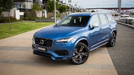 Sleek Blue SUV by the Waterfront wallpaper