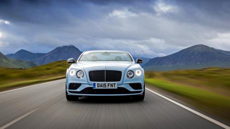 Sleek Luxury Car on a Scenic Journey wallpaper
