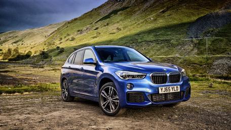 Elegant BMW SUV in Stunning Landscape wallpaper