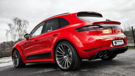Sleek Red SUV with Dynamic Design and Custom Features wallpaper