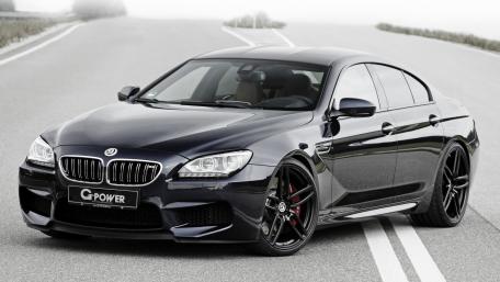 Sleek Black Luxury Sports Car Wallpaper wallpaper