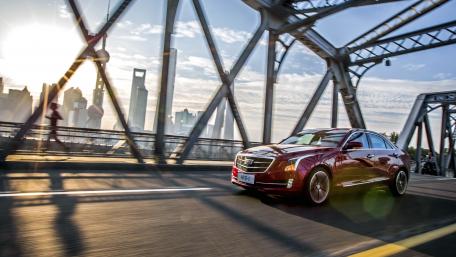 Stunning Urban Drive with a Luxury Sedan wallpaper
