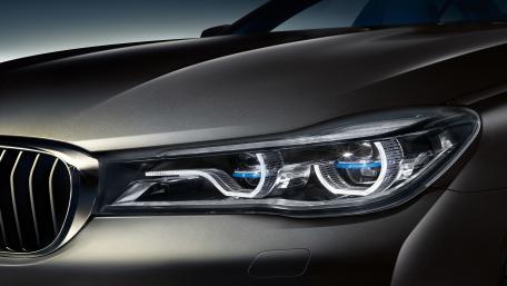 Sleek BMW Headlight Design Modern Elegance in Automotive Engineering wallpaper