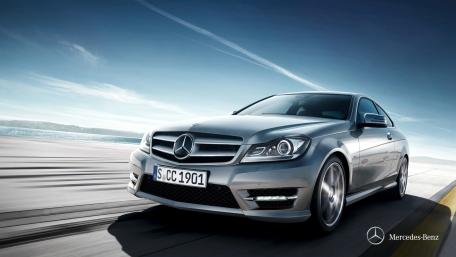Sleek Silver Mercedes Benz on the Open Road wallpaper