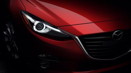 Sleek Red Car in Shadows wallpaper