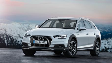 Sleek Audi in Snowy Landscape wallpaper