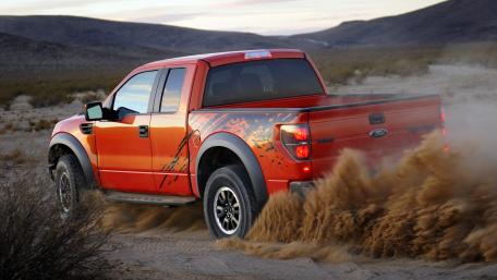 Vibrant Off-Road Adventure in a Pickup Truck wallpaper