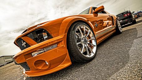 Sleek Orange Ford Mustang GT500 Wallpaper wallpaper