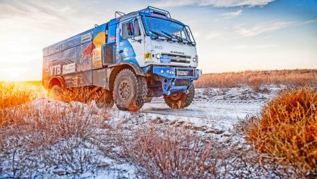Epic Truck Adventure in Winter Landscape wallpaper