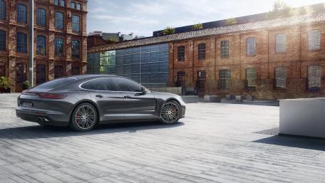 Sleek Elegance of a Modern Car in Urban Setting wallpaper