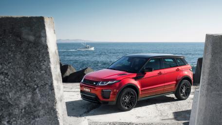 Red SUV by the Serene Shoreline wallpaper