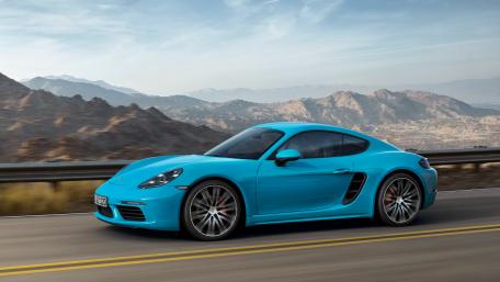 Sleek Blue Sports Car on an Open Road wallpaper