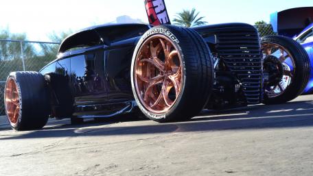 Sleek Custom Car with Stunning Wheels and Shine wallpaper