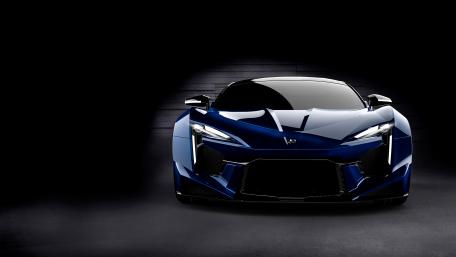 Sleek Blue Sports Car Wallpaper wallpaper