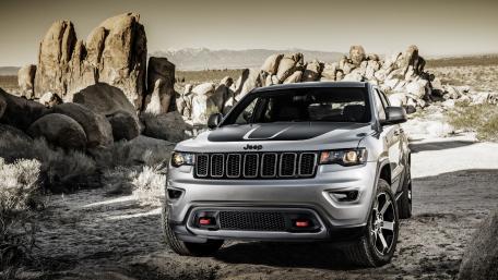 Sleek Jeep SUV in Desert Landscape wallpaper