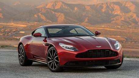 Sleek Aston Martin in a Scenic Landscape wallpaper