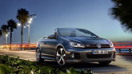Sleek Volkswagen GTI Convertible at Sunset wallpaper
