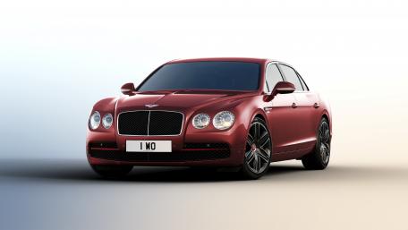 Sleek Red Luxury Sedan Wallpaper wallpaper