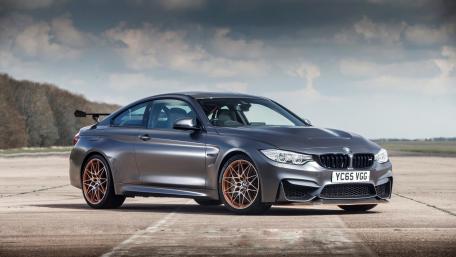 Sleek BMW M4 Coupe on Open Road wallpaper