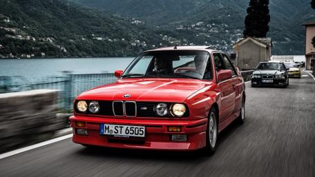 Classic BMW M3 Driving by Scenic Lakeview wallpaper