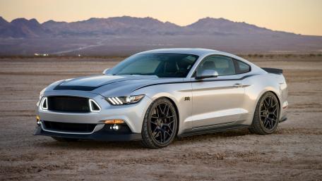 Sleek Silver Muscle Car in Stunning Desert Landscape wallpaper