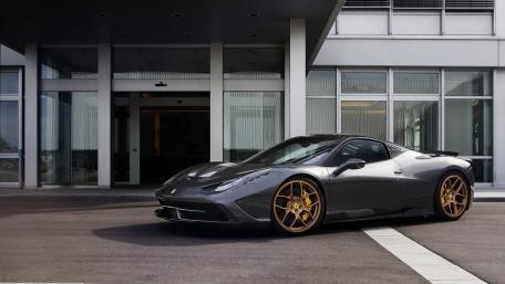 Sleek Luxury Sports Car in Urban Setting wallpaper