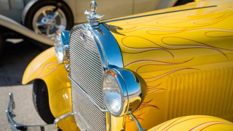 Classic Yellow Hot Rod with Flame Design wallpaper