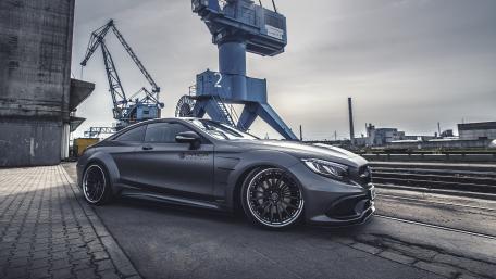 Sleek Performance Coupé by Industrial Backdrop wallpaper