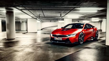 Vibrant Red BMW in Underground Garage View wallpaper