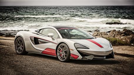 Sleek McLaren by the Shoreline in 4K Resolution wallpaper