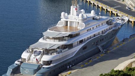Luxury Yacht at Dockside in Stunning Marina View wallpaper