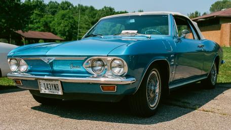 Classic Blue Convertible on Display in Nature wallpaper