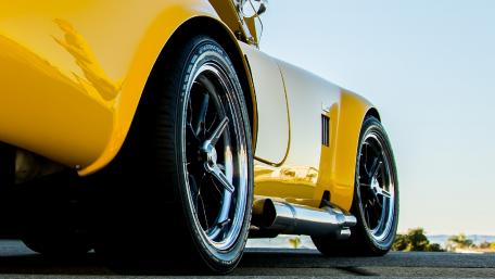Classic Yellow Car Showcase wallpaper