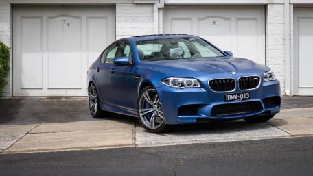 Sleek Blue BMW M5 on the Streets wallpaper