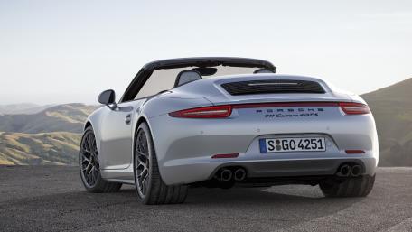 Sleek Porsche 911 Carrera 4S Convertible on Scenic Road wallpaper